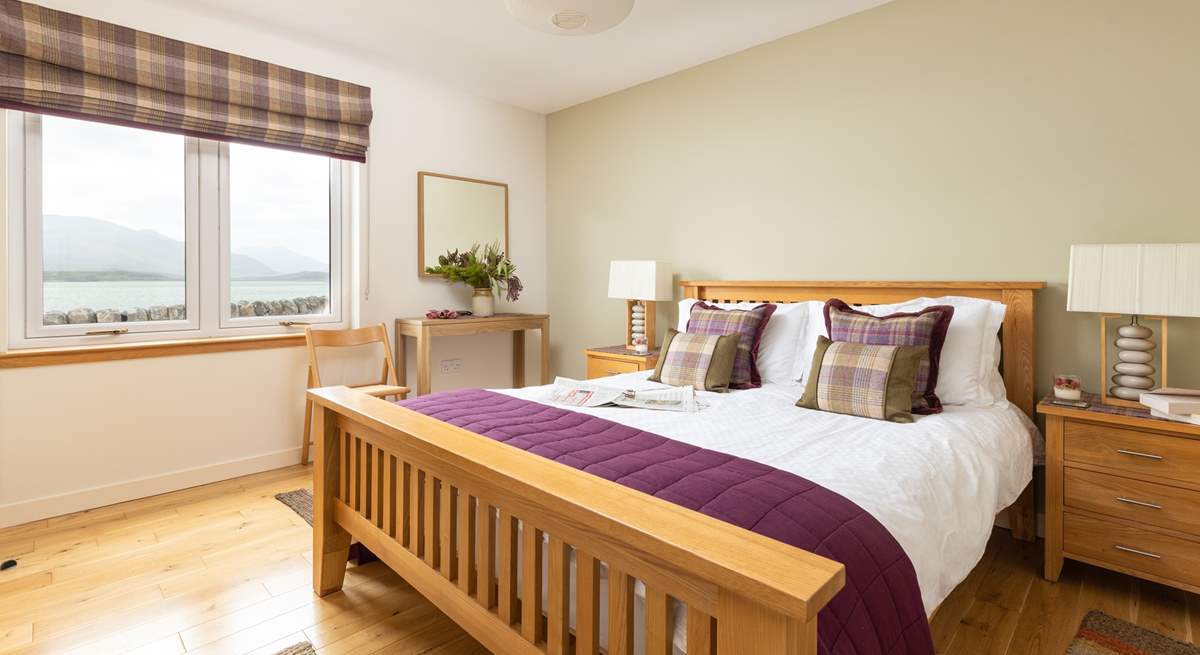 The main bedroom has a comfortable king-size bed and more amazing views.