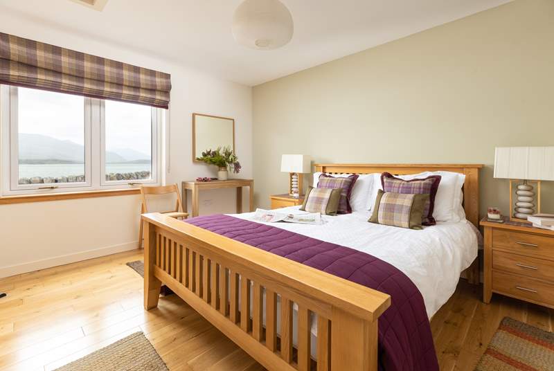 The main bedroom has a comfortable king-size bed and more amazing views.