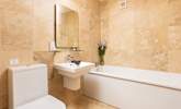 The generous-sized  en suite bathroom. - Thumbnail Image