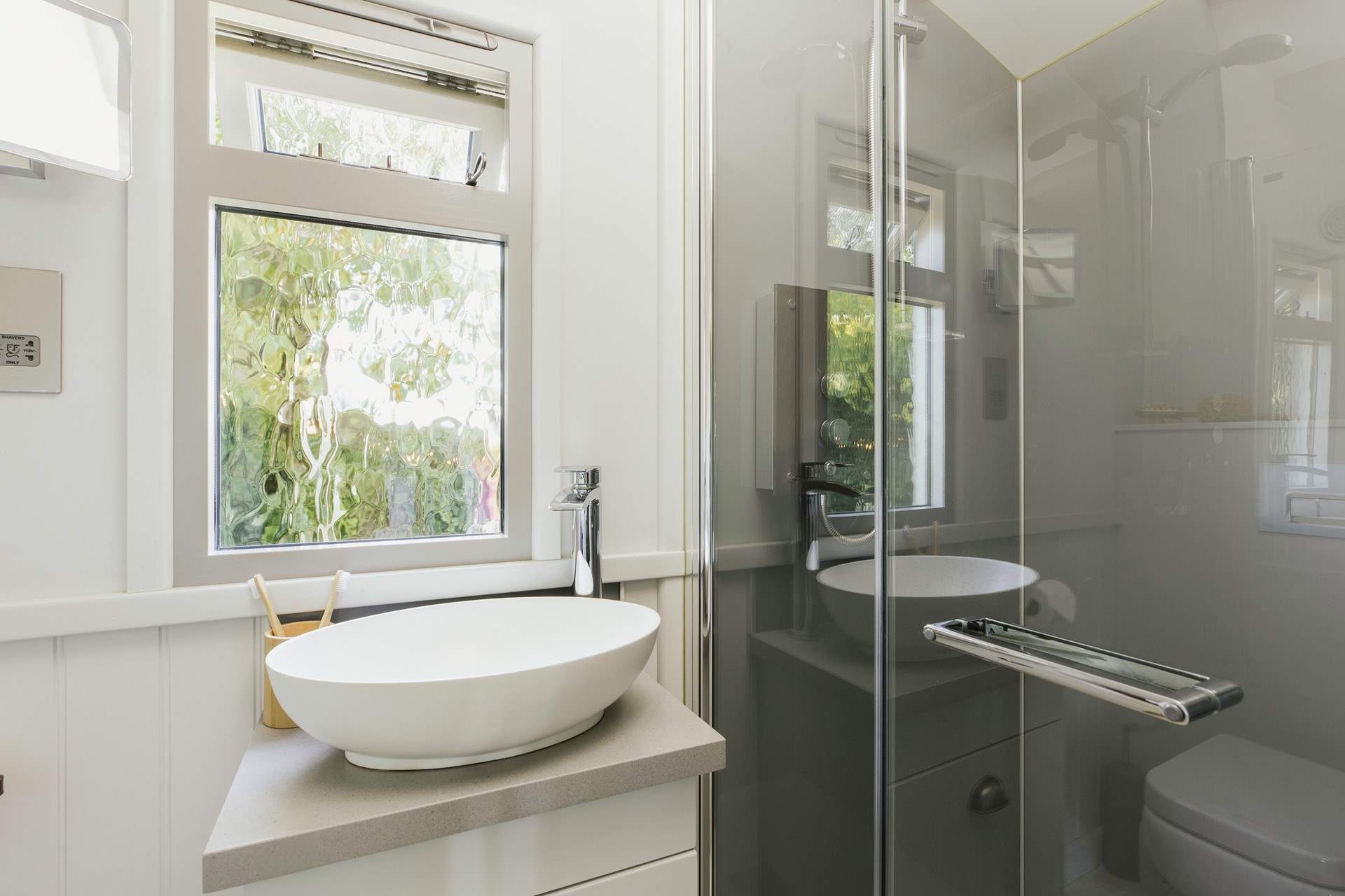 You'll love freshening up in the sleek shower-room!