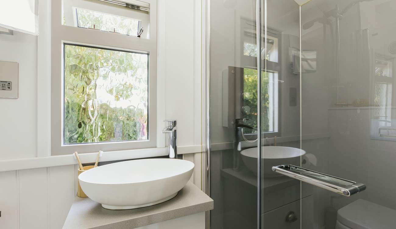 You'll love freshening up in the sleek shower-room!
