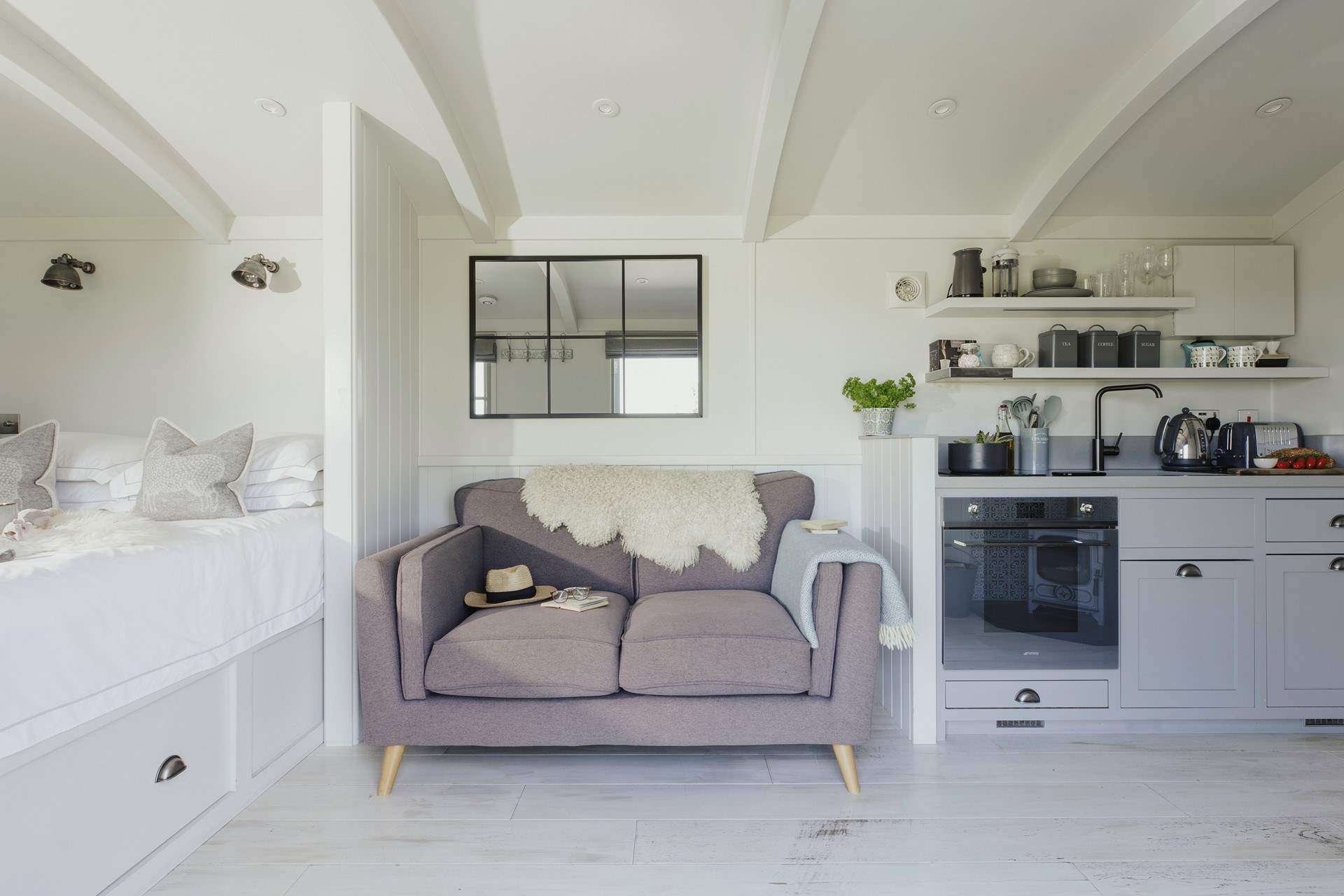 Get lost in a good read on the comfy sofa.