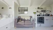 Get lost in a good read on the comfy sofa.