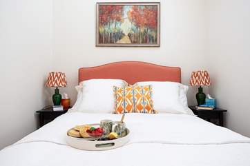 Snuggle up in luxury linen in the king-size bed and enjoy breakfast in bed.