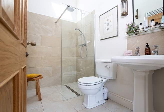 Enjoy a spot of me time in this stylish wet-room with rainfall shower. 