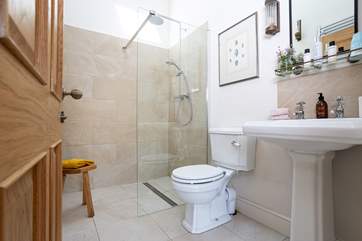 Enjoy a spot of me time in this stylish wet-room with rainfall shower.