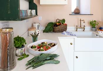 The large butler sink and vintage taps perfectly complement the kitchen
