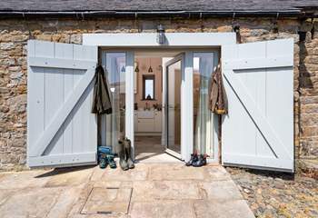 The entrance door with original barn door shutters, get your boots ready for a day of hiking.