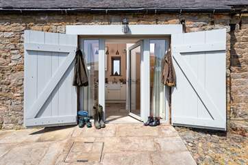 The entrance door with original barn door shutters, get your boots ready for a day of hiking.