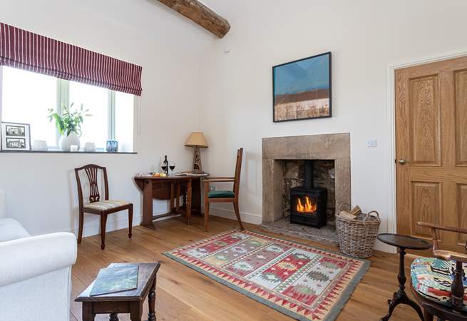 Sit by the crackling fire, courtesy of the wood-burner in the cosy snug and watch a spot of TV.
