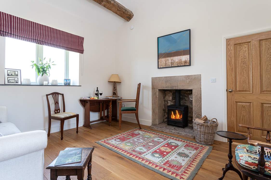 Sit by the crackling fire, courtesy of the wood-burner in the cosy snug and watch a spot of TV.