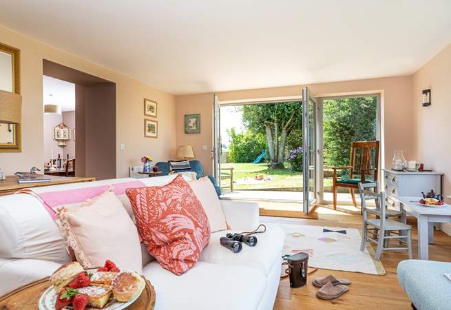 Open the French doors in the sitting-room and let the countryside air flow in.