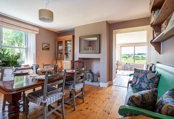 Pop a cork or two in the elegant dining-room which looks over the garden.