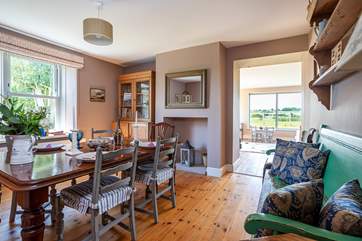 Pop a cork or two in the elegant dining-room which looks over the garden.