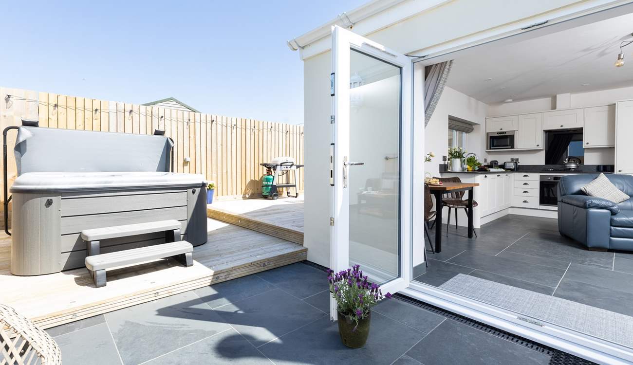 Step out and enjoy the luxury of the hot tub!