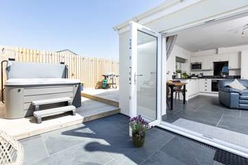 Step out and enjoy the luxury of the hot tub!