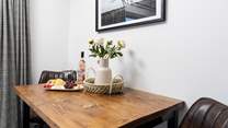 The table is perfectly positioned to the side of the open plan living area.