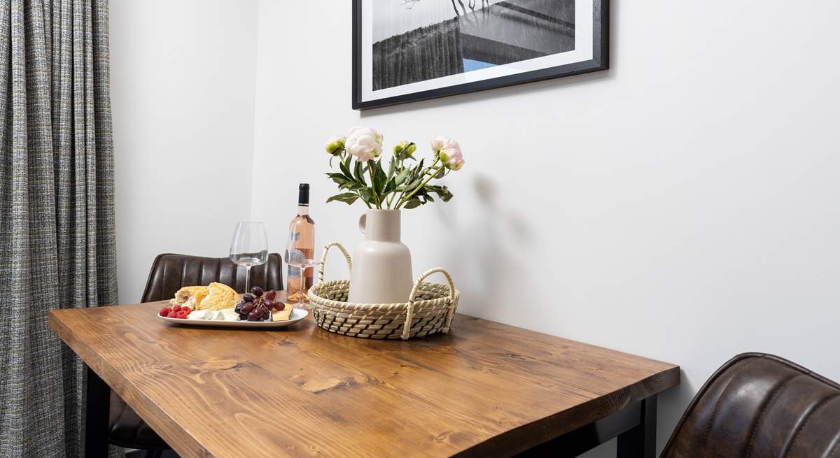 The table is perfectly positioned to the side of the open plan living area.