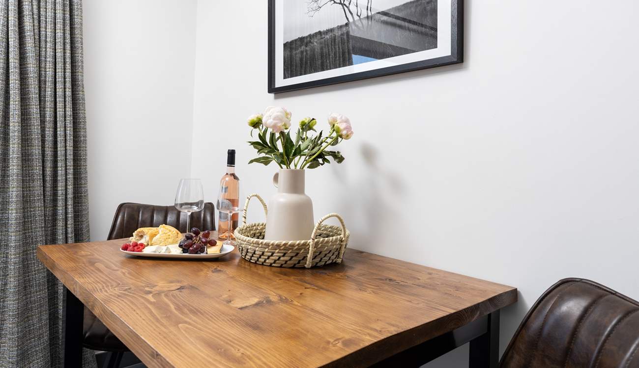 The table is perfectly positioned to the side of the open plan living area.