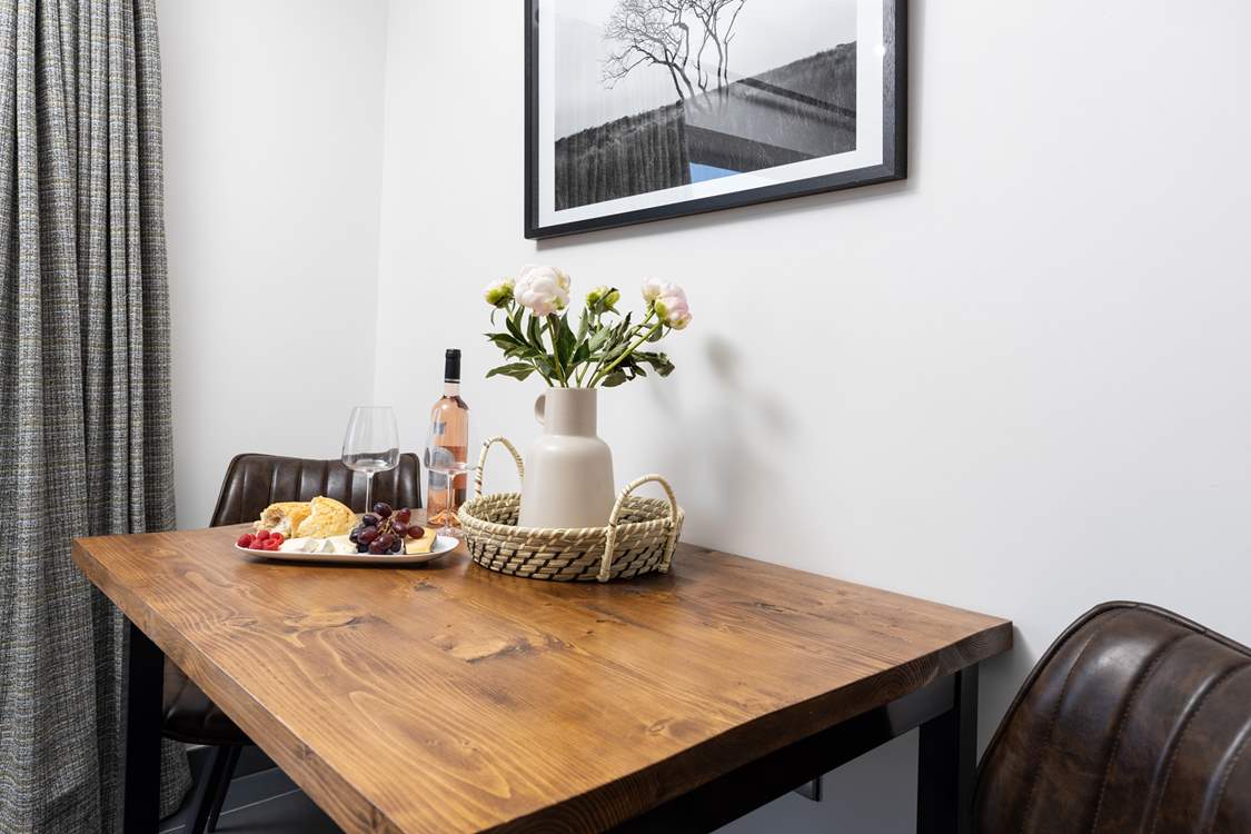 The table is perfectly positioned to the side of the open plan living area.