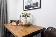 The table is perfectly positioned to the side of the open plan living area.