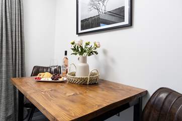 The table is perfectly positioned to the side of the open plan living area.