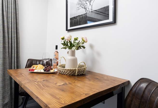 The table is perfectly positioned to the side of the open plan living area.