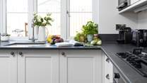 The kitchen looks out over your decking area.