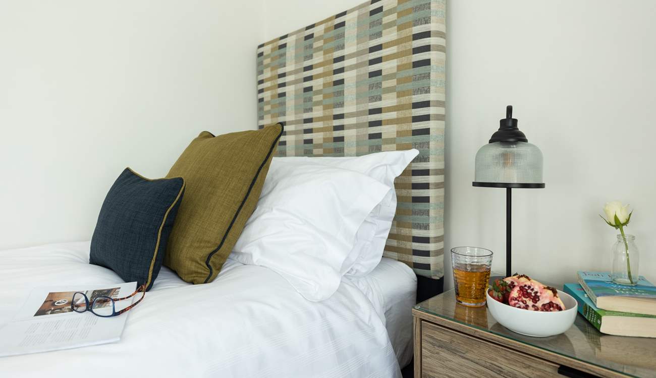 Bedroom 2 enjoys another gorgeous bed with beautiful fabrics and is situated to the back of The Copps.