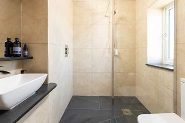 The shower-room sits next to bedroom 1 and enjoys that all important under-floor heating.