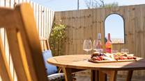 The decking area also has the perfect al fresco eating spot. 