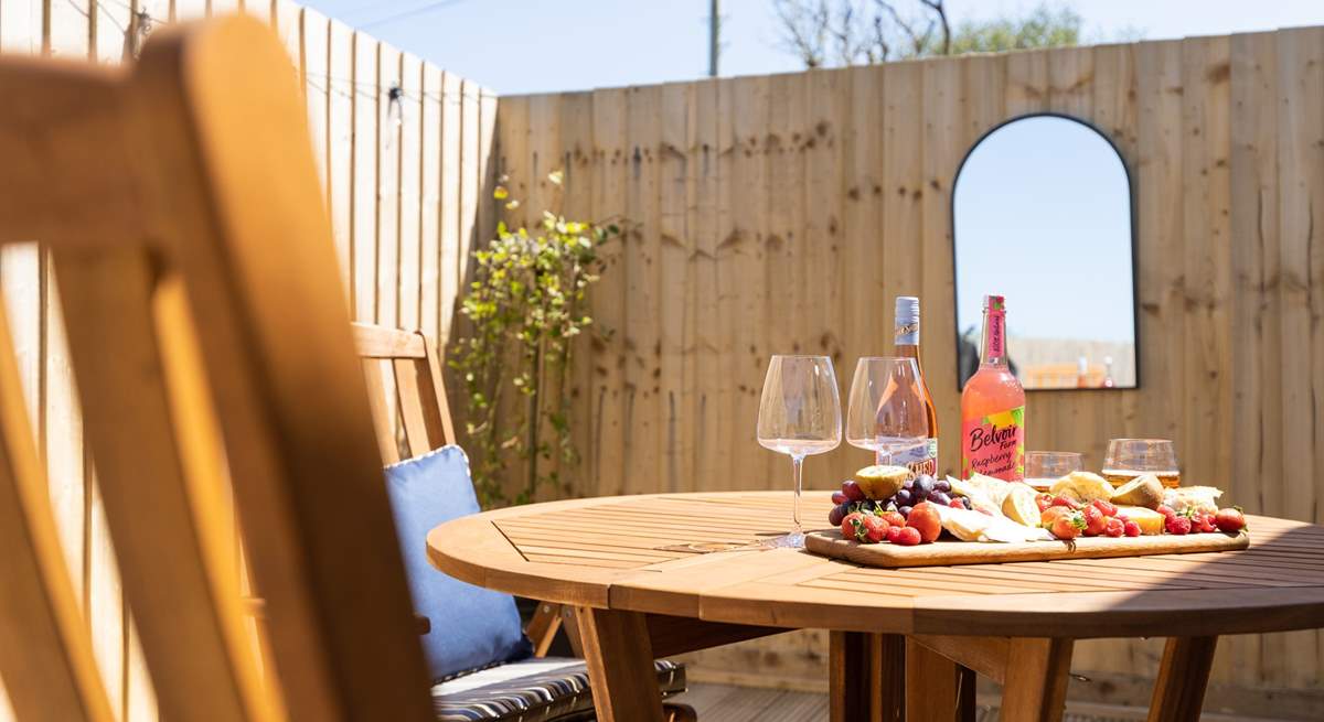 The decking area also has the perfect al fresco eating spot. 