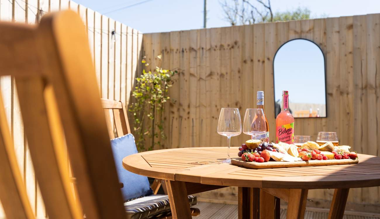 The decking area also has the perfect al fresco eating spot. 