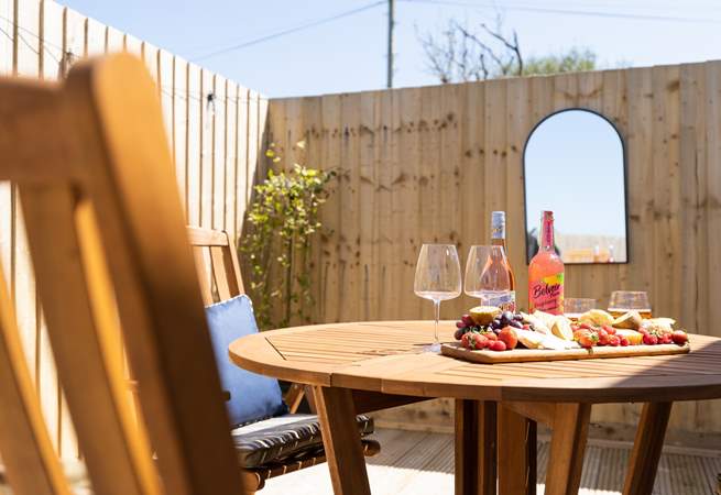 The decking area also has the perfect al fresco eating spot. 