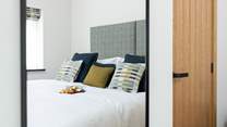Bedroom 1 has a lovely relaxed feel thanks to the styling and fabrics.