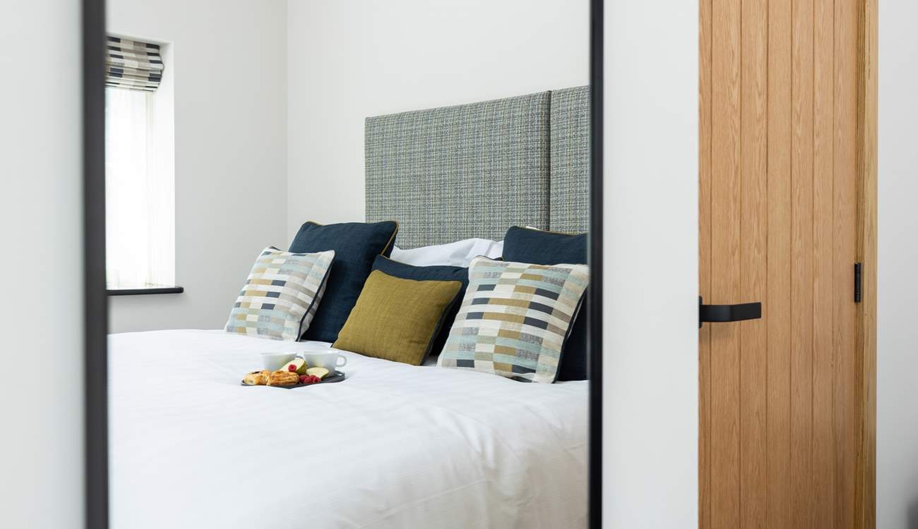 Bedroom 1 has a lovely relaxed feel thanks to the styling and fabrics.