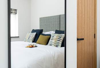 Bedroom 1 has a lovely relaxed feel thanks to the styling and fabrics.
