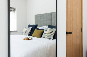 Bedroom 1 has a lovely relaxed feel thanks to the styling and fabrics.