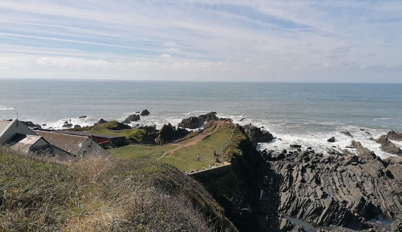 Take in the views from Hartland Quay and enjoy a drink from the pub.