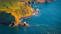 Head off on a walk and end up at Hartland Point Lighthouse!