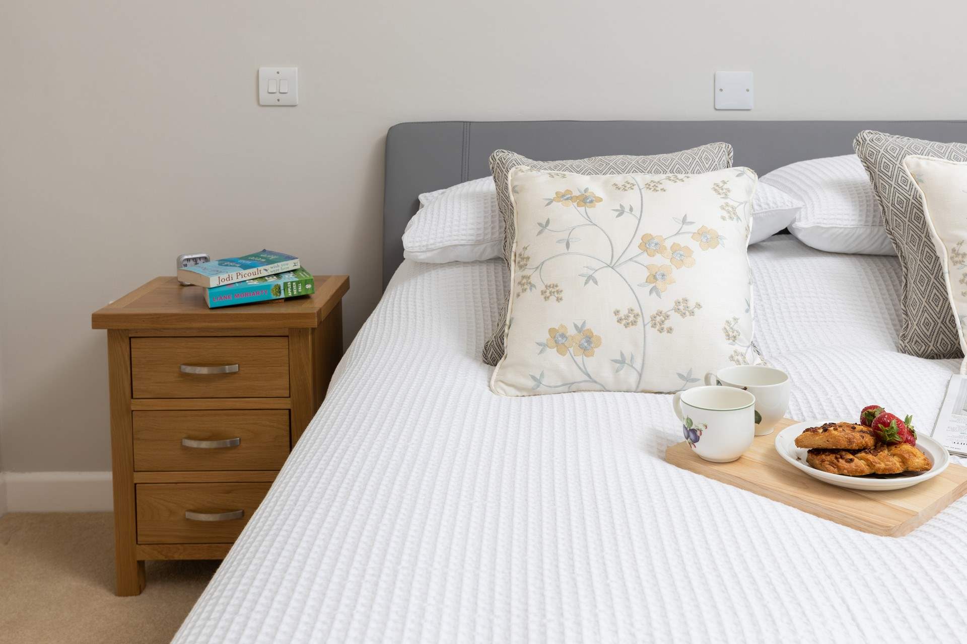 The bedrooms feel ultra luxurious with the snug waffle bedding.