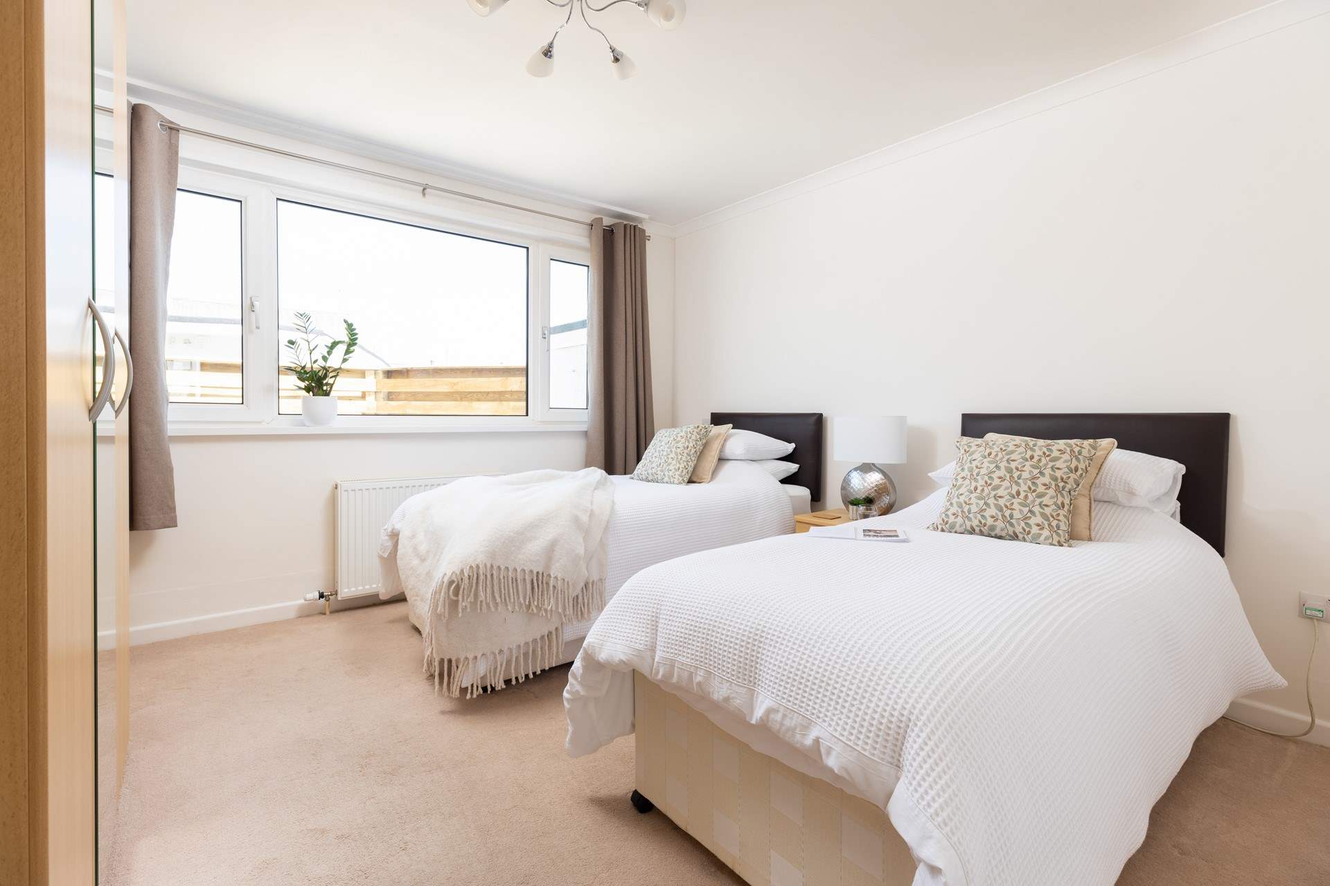 Bedroom 2 is also super spacious with twin beds.