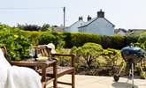 The stunning patio outside the front entrance is perfect for a barbecue supper. - Thumbnail Image