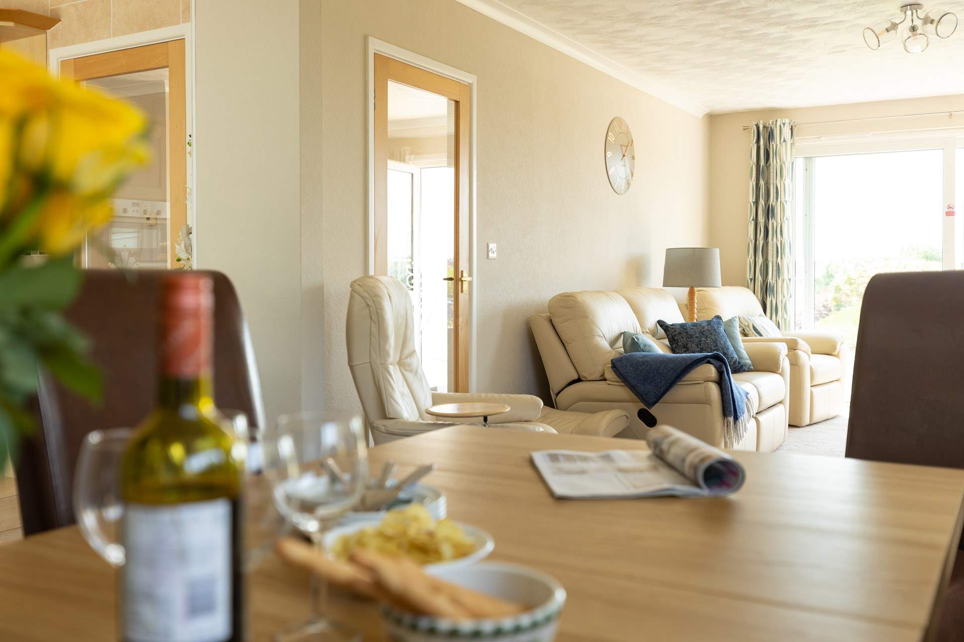 Looking over towards the comfy sofas in this delightful open space, perfect for spending quality time with your loved ones. 