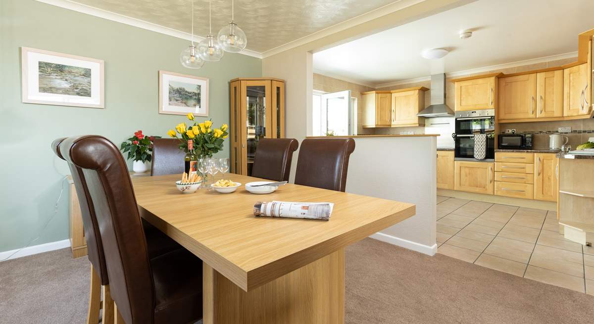 The breakfast-bar overlooks this lovely dining space which is open plan. 