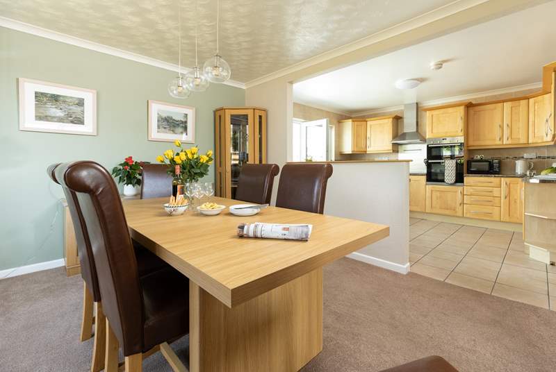 The breakfast-bar overlooks this lovely dining space which is open plan. 