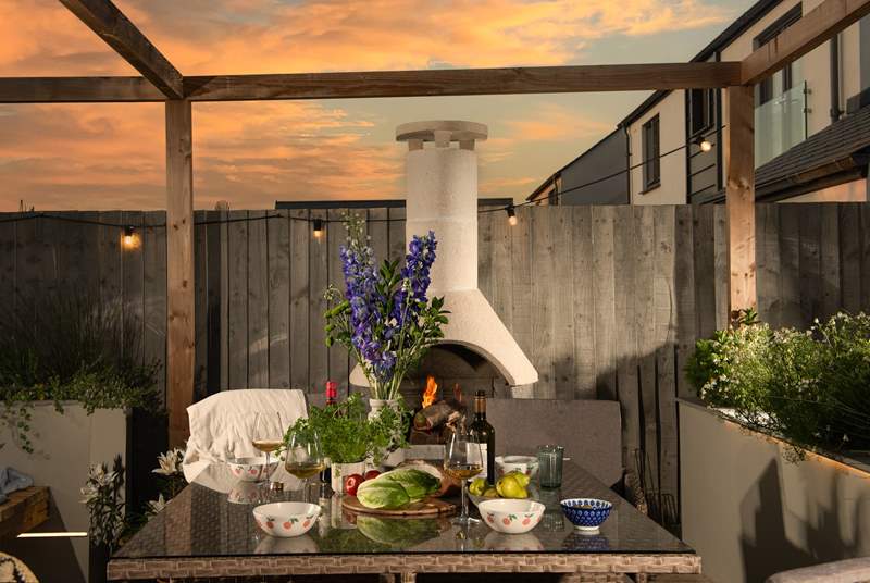 Light the chiminea and enjoy summertime suppers.