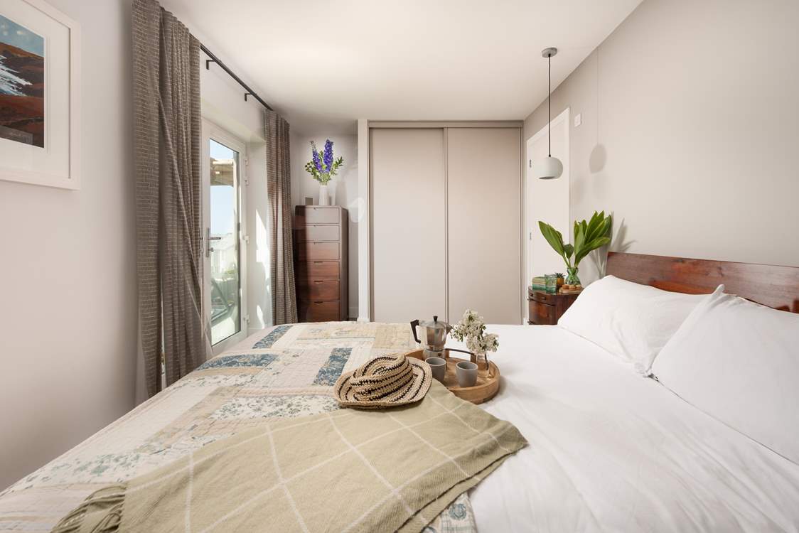 Bedroom 1 is a beautiful king room.