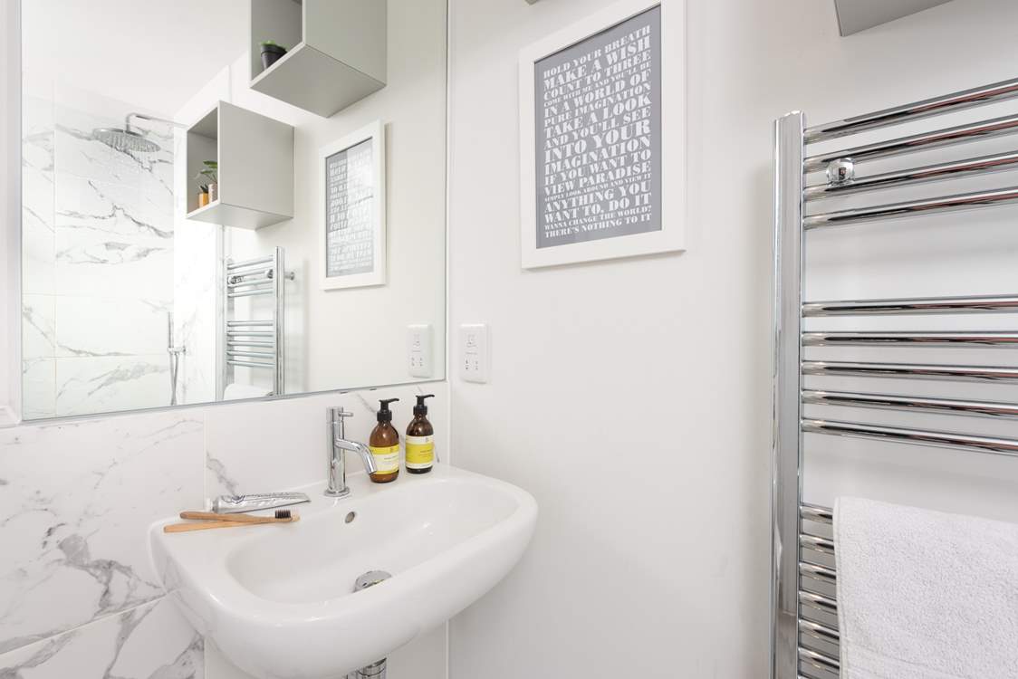 Bedroom 1 has an en suite shower-room.