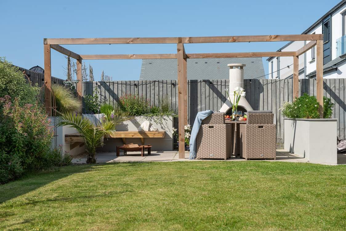 With outdoor seating and a chiminea.